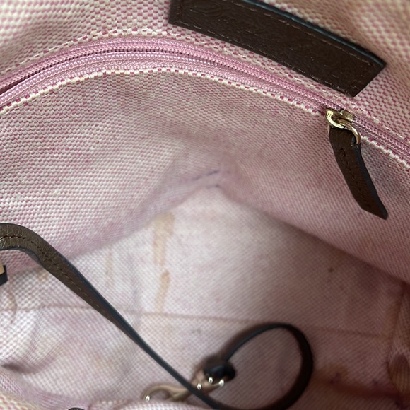 Dooney and Bourke. Brown leather shoulder bag. Has interior stains. - Picture 10 of 14